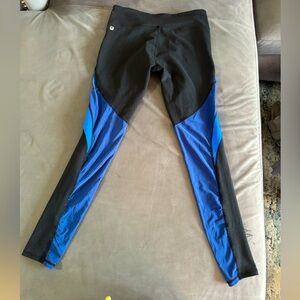 Size S FABLETICS Black and Royal blue leggings . Squat proof. Sweat wicking .
